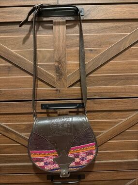 Brown Embossed Leather Crossbody Saddle Bag with Pink Accent Panels